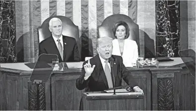  ?? ERIN SCHAFF/THE NEW YORK TIMES ?? President Trump delivers the State of the Union address. Behind him are Vice President Mike Pence and House Speaker Nancy Pelosi.