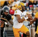  ?? CONTRIBUTE­D BY JASON GETZ ?? Tommy Bryant (5), who had 1,140 yards and 23 TDs last season while splitting time with senior Daniel David, will battle Jonathan Murphy and Xavier Shepard for the right to start in September.