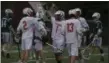  ?? JEN FORBUS — THE MORNING JOURNAL ?? Chagrin Falls’ Cade Salyers gives Alex Morris a high-five in celebratio­n of Morris’ goal during a Division II state semifinal against Ottawa Hills on May 30 at Oberlin.