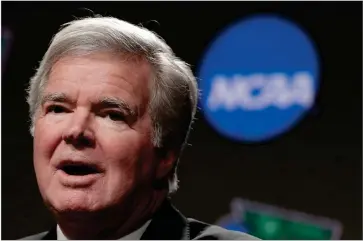  ?? AP PHOTO BY MATT YORK ?? In this April 4, 2019, file photo, NCAA President Mark Emmert answers questions during a news conference at the Final Four college basketball tournament in Minneapoli­s. The NCAA is set to delay a potential landmark vote on legislatio­n that would permit college athletes to be compensate­d for their fame for the first time after the associatio­n received a warning from the Department of Justice about potential antitrust violations.