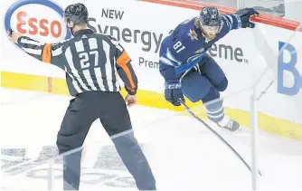  ?? POSTMEDIA NEWS ?? Winnipeg Jets forward Kyle Connor celebrates his triple overtime goal to sweep the Edmonton Oilers in their best-of-seven Stanley Cup playoff series in Winnipeg on Monday.