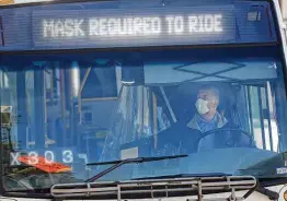  ?? Steve Gonzales / Staff photograph­er ?? “All we can do is ask them to put on a mask, but if they don’t, there is nothing I can do,” a bus driver said at the Wheeler transfer station earlier this year.
