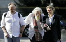  ?? LEWIS JOLY — THE ASSOCIATED PRESS ?? French/British actor Michael Lonsdale, center, arrives for the funeral of French film director Jean Pierre Mocky at Saint Sulpice church in Paris, Monday.