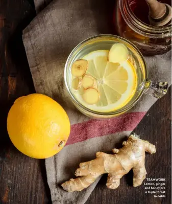  ??  ?? TEAMWORK Lemon, ginger and honey are a triple threat
to colds