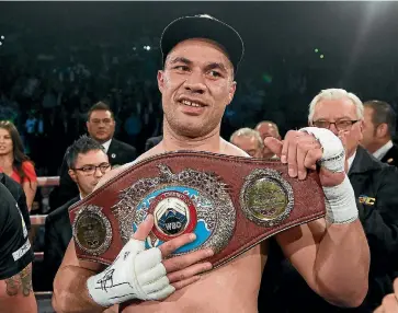  ??  ?? Joseph Parker displays the WBO heavyweigh­t belt he will put on the line against Anthony Joshua.