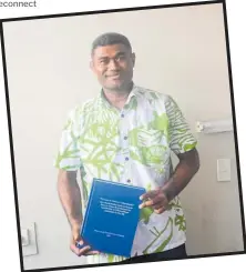  ?? Picture: MELI FARASIKO ?? Dr Ilisoni Leweniqila with his PhD thesis in his office.