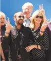  ?? AFP ?? RINGO STARR, his wife Barbara Bach, and actor Ed Bagley, Jr. appear at the Peace & Love birthday celebratio­n for Starr at Capitol Records on July 7 in Los Angeles, California.