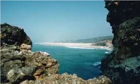  ?? Photograph: Tony Arruza/Getty Images ?? A vintage shot of an undevelope­d stretch of coast in southern Portugal, as Rose Macaulay might have seen it on her Iberian travels.
