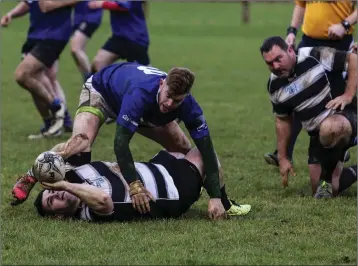  ??  ?? Rathdrum and Houndogs battle it out at the 43rd annual charity Houndogs rugby match in Rathdrum. photos: Garry O’Neill