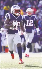  ?? Maddie Meyer / Getty Images ?? Patriots running back Sony Michel rushed for 129 yards and three touchdowns in Sunday’s win over the Chargers.