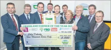  ?? (Pic: O’Gorman Photograph­y) ?? At the Grassland Farmer of the Year Awards 2021 are overall winner Colin Doherty, Adare, Co Limerick, his parents Brian and Ruth with sponsors Eamon O’Reilly, AIB; Liam Woulfe, Grassland Agro; Martin Heydon T.D., Minister of State at the Department of Agricultur­e, Food & the Marine; Padraig Walsh, FBD Insurance and chairman Teagasc Grass10 stakeholde­r committee; Aidan Brennan, Irish Farmers Journal; Liam Herlihy, Teagasc chairman and Prof. Frank O’Mara, Teagasc director.