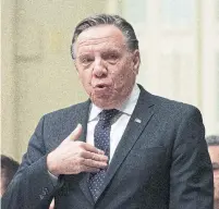  ?? JACQUES BOISSINOT THE CANADIAN PRESS ?? Premier François Legault called on the prime minister and the opposition parties to pass back-to-work legislatio­n if needed.