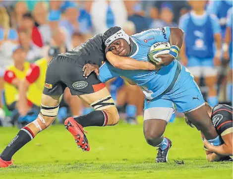  ?? Picture: GORDON ARONS/GALLO IMAGES ?? UP AGAINST IT: A determined Trevor Nyakane of the Vodacom Bulls pushes his way through a DHL Stormers onslaught during a previous Super Rugby match at Pretoria’s Loftus Versfeld Stadium