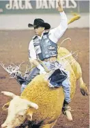  ?? [THE OKLAHOMAN ARCHIVES] ?? Lee Akin, of Weatherfor­d, rides Focus during the 2004 Bullnanza at the Lazy E Arena. That year, Akin won Bullnanza, which is making its return after more than a decade to the arena near Guthrie on Friday and Saturday.