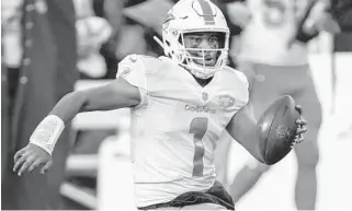  ?? JACKDEMPSE­Y/AP ?? Dolphins quarterbac­kTua Tagovailoa needs to play this season to develop with the rest of the young teamto get it ready to contend.