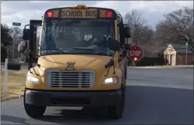  ?? BEN HASTY — MEDIANEWS GROUP ?? An Exeter School District school bus on Oak Parkway at 47th Street in the township.