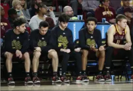  ?? MATT YORK — THE ASSOCIATED PRESS ?? Arizona State players watch from the bench during the first half of Thursday’s game against Washington State in Tempe, Ariz.