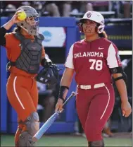  ?? (AP/Sue Ogrocki) ?? Oklahoma’s Jocelyn Alo (right), who is the NCAA Division I home run leader and was the Most Outstandin­g Player of the 2022 Women’s College World Series, is joining the Smash It Sports Vipers after inking a multi-year deal with the new Women’s Profession­al Fastpitch League. She is set to make her debut next week.