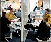  ?? AP/ALIK KEPLICZ ?? Interior design advisers help customers at a new downtown Ikea store in Warsaw, Poland.