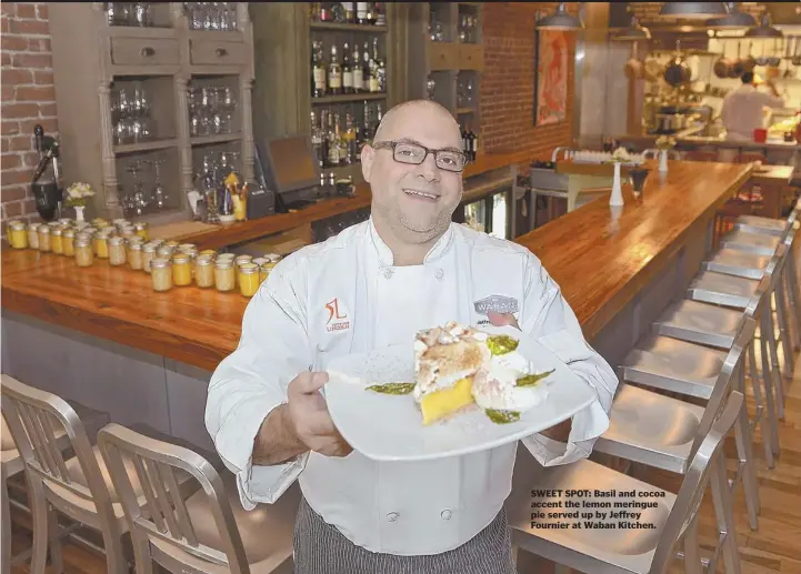  ??  ?? SWEET SPOT: Basil and cocoa accent the lemon meringue pie served up by Jeffrey Fournier at Waban Kitchen.