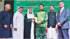  ?? Clint Egbert/Gulf News ?? Sinan Ashfaq accepts the award on behalf of his brother Ammar.