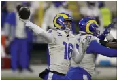  ?? MATT LUDTKE — THE ASSOCIATED PRESS ?? Rams quarterbac­k Jared Goff, an MC alum, passes during the first half of their divisional playoff game against the Packers on Saturday in Green Bay, Wis.