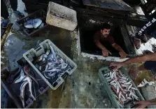  ?? Reuters ?? Gaza’s fishing sector has been hit hard by the war, as Israeli military patrols prevent fishermen from going out to sea