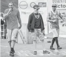  ??  ?? Dance entertaine­rs Beat the Streets incorporat­ed visitors such as Calgary resident Matthew Geddes, centre, into the act.