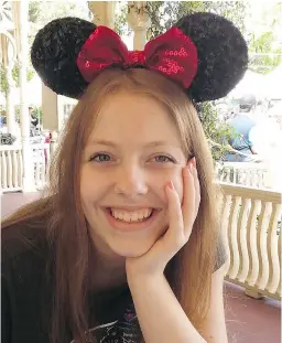  ??  ?? Kitsilano Secondary School student Lily Hall enjoys a bright moment during a Make-A-Wish trip to Disneyland.