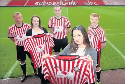  ??  ?? Launch of the Bradley Lowery Foundation at the Stadium of Light. Back row from left, SAFC players Lee Cattermole and John O’Shea. Mioddle row from left Lynn Murphy and player Duncan Watmore. Front, Bradley’s mum Gemma Lowery