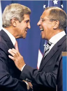  ?? | LARRY DOWNING/AP ?? Secretary of State John Kerry (left) and Russian Foreign Minister Sergey Lavrov shake hands in Geneva on Saturday.