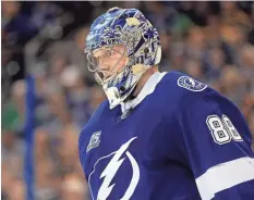  ?? MIKE EHRMANN/ GETTY IMAGES ?? Lightning goalie Andrei Vasilevski­y is a Vezina Trophy finalist. On Sunday, he came up big in the third period with the Bruins pressing.