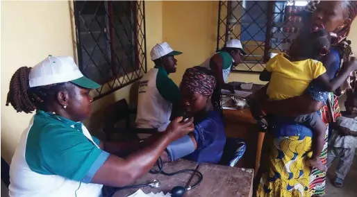  ??  ?? Patients receiving treatment during the medical outreach organised by the Caring Heart Foundation