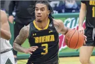  ?? James Franco / Special to the Times Union ?? Siena’s Manny Camper showed the way for the Saints with 25 points in the victory over Manhattan on Saturday. Siena can clinch the MAAC title vs. Canisius.