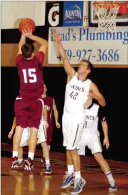  ?? MARK HUMPHREY ENTERPRISE-LEADER ?? Lincoln sophomore Harrison Swayne gets off a shot in the lane against Shiloh Christian. Lincoln came from behind on Feb. 19 to defeat the Saints on their home court, 55-50, to reach the District 4A-1 semifinals.