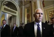  ??  ?? Vice President Mike Pence talks to reporters in the Capitol on Capitol Hill in Washington on Wednesday.