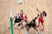  ??  ?? All eyes are on the ball in the goal circle as the Silver Ferns, after a shaky second quarter, eased to a 70-44 win over Wales.