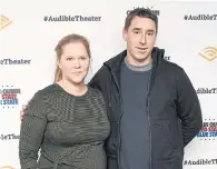  ??  ?? Comedian Amy Schumer and husband Chris Fischer.