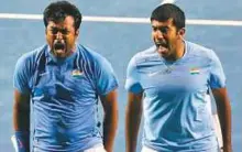  ?? AFP ?? Leander Paes (left) and Rohan Bopanna won their doubles match in three sets 5-7, 7-6 (5), 7-6 (3).