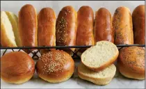  ?? Deb Lindsey/Washington Post ?? Cookout burger and hot dog buns don’t require settling for a bag from the grocery store. Your own dough, and a variety of ingredient­s, can customize your summer grilled goods.