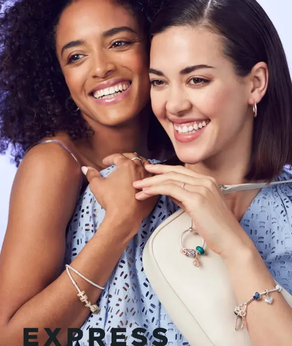  ??  ?? Model on left wears: Charm Double Hoop Earrings, $119. Sparkling Leaves Ring $89. Double Wrap Bracelet, $169. Safety Chain Clip Charm, $169.Sparkling Pave Lines Clip Charm, $119. All by Pandora. Model on right wears: Charm Hoop Earrings, $99. Sparkling Leaves Ring, $89. Heart Closure Bracelet, $119. Charms, from $45. All by Pandora. Worn on bag: Medium Bag Charm Holder, $139. Charms, from $39. All by Pandora.