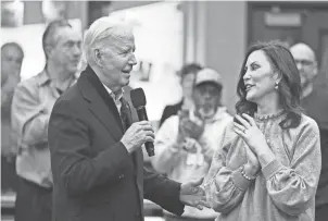  ?? MANDEL NGAN/AFP VIA GETTY IMAGES ?? U.S. President Joe Biden speaks alongside Michigan Gov. Gretchen Whitmer during a visit to a United Auto Workers (UAW) phone bank in Warren on Feb. 1.