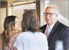  ?? Carol Kaliff / Hearst Connecticu­t Media ?? Rich Dupont, Republican candidate for the 5th District seat that U.S. rep. Elizabeth Esty is leaving this fall, chats with supporters at a campaign fundraiser at the Sunset Grille in Watertown on Thursday, with Tina Bernarda, left.