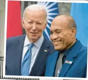  ?? AP ?? President Biden and Kiribati President Taneti Maamau (above) are all smiles Monday as they pose for group photo (below) of Pacific Islands Forum leaders at the White House.