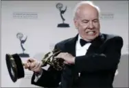  ?? MATT SAYLES - ASSOCIATED PRESS ?? In this Sept. 13, 2008 file photo, actor Tim Conway poses with his award for Outstandin­g Guest Actor in a Comedy Series for his work on “30 Rock” in the press room at the Creative Arts Emmy Awards in Los Angeles.