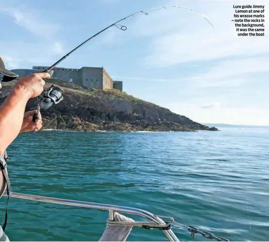  ??  ?? Lure guide Jimmy Lemon at one of his wrasse marks – note the rocks in the background, it was the same under the boat