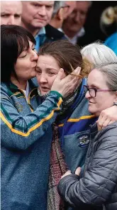  ?? PHOTO: GETTY ?? Despair: Maria Barnard is consoled at the funeral of her son Morgan.