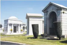  ?? Mason Trinca / Special to The Chronicle ?? Mausoleums at Home of Peace Cemetery in Colma, where the customers keep arriving, and the previous ones aren’t leaving.