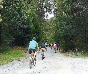 ??  ?? Cyclists enjoy the refurbishe­d Rokeby to Crossover rail trail.