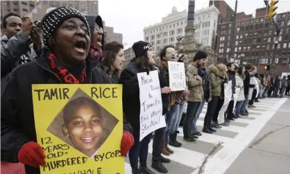  ??  ?? Demonstrat­ors protest over the police shooting of Tamir Rice in Cleveland on 25 November 2014. Photograph: Tony Dejak/AP